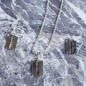 Goth pink razor blade necklace and earring set rockabilly style